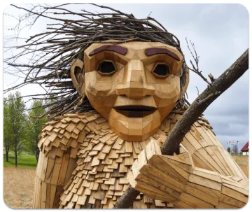 Large wooden troll sculpture