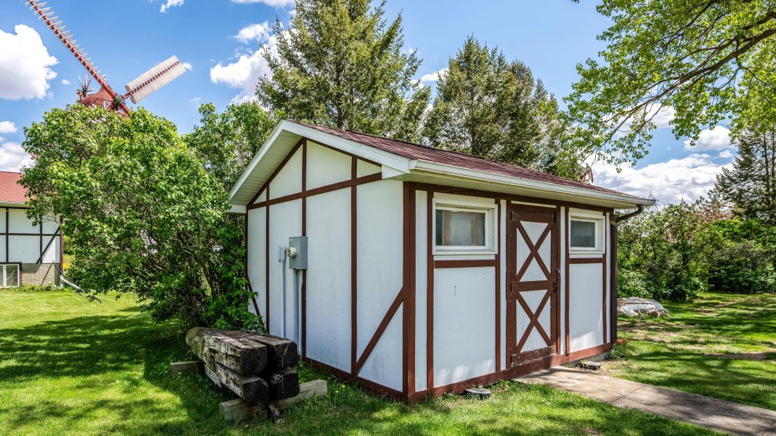 Outdoor campus area showing Grounds Storage Shed.