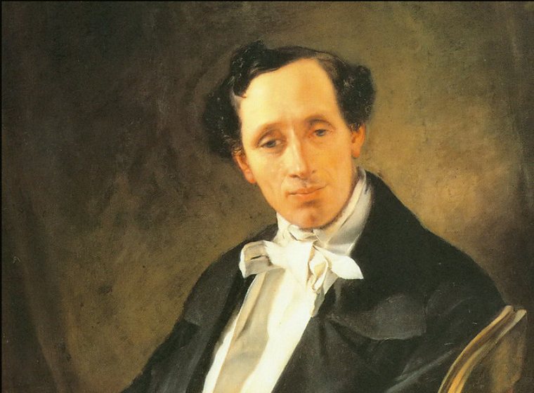Painted portrait of Hans Christian Andersen seated in a dark coat and white cravat.