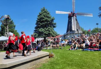 Danish Windmill event scene showing Event Tivoli Dancing Kids.